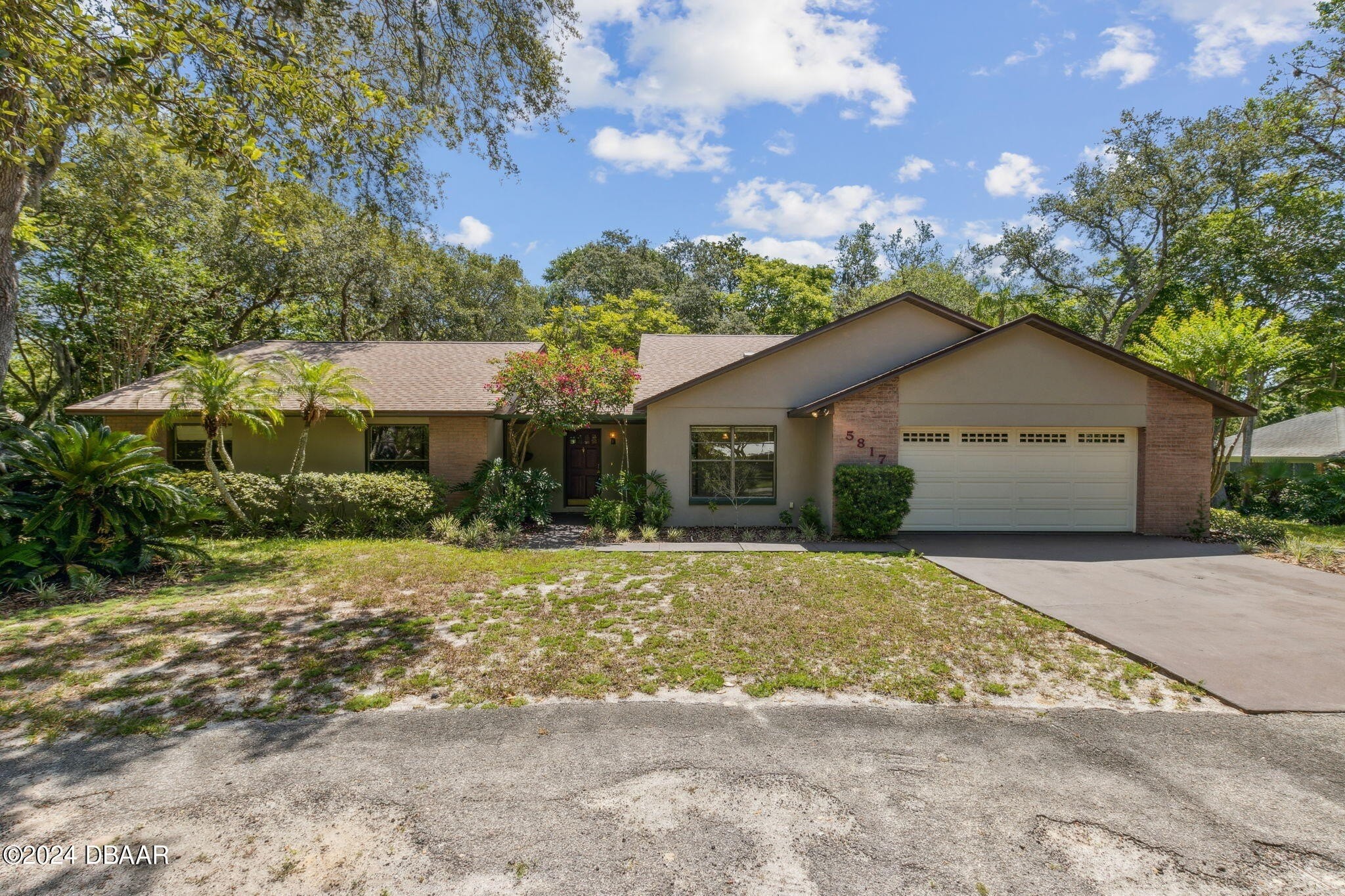 1. 5817 Spruce Creek Woods Drive