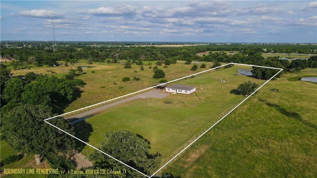 1. 1008 County Road 221 (+/- 4 Acres)