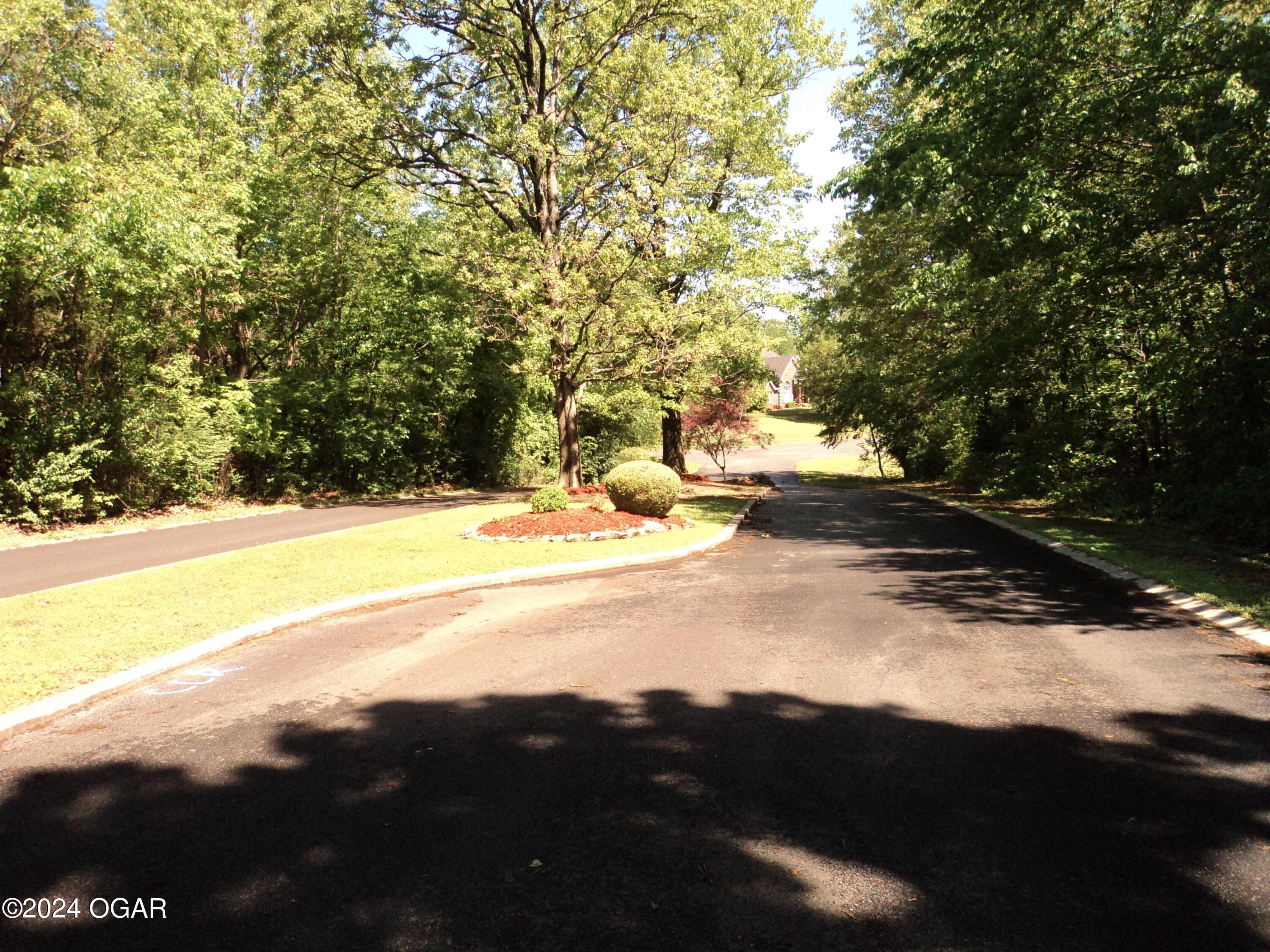 6. 000 Stone Ledge Lane