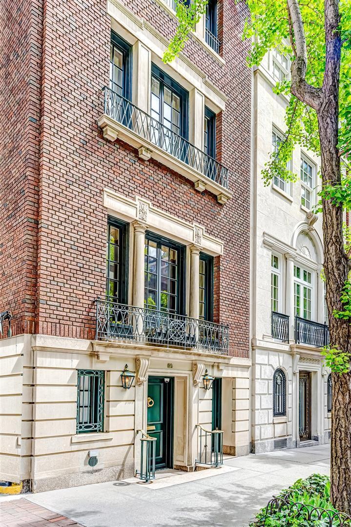 This magnificent Neo-Georgian townhouse on the Upper East Side offers a glimpse into the Gilded Age, yet with all the creature comforts of today. Built in 1901, its notable past residents included fashion designer Tommy Hilfiger.  The brick and limestone Neo-Georgian facade opens to the light-filled garden level. Beyond the grand foyer is a powder room, sitting room, an office, and double doors to the patio.