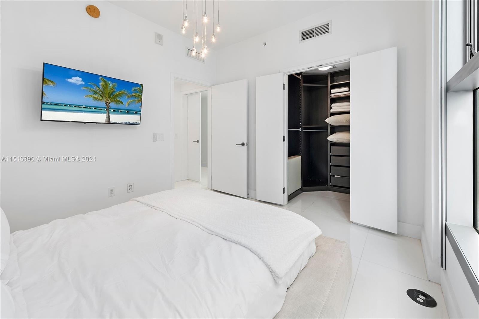 11. 6899 Collins Ave